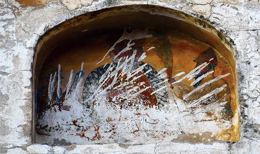 Dilapidated painting of Guru Nanak with his companiions.