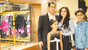Shoaeb Shams, CEO of Fashion Central with his fashion friendly wife Annie and their two children 