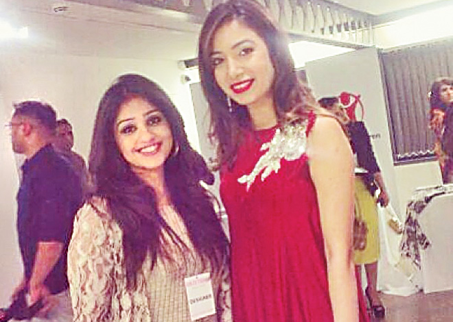 Sadaf Raza (right) poses with Mashal Moazzam, one of the many designers she and her team have handpicked to stock at their store