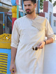 In case you boys have been feeling left out of the lawn mania that overtook half the population come March, Gul Ahmed has a great line of men's kurtas in this popular summer fabric. You can opt for a dyed one in a subtle shade of blue, a classic white latha kameez or, if you are the daring sort, a kurta with a splash of print like the one pictured here. Grab yours at an Ideas outlet for under PKR 5,000 before the Eid deluge wipes them off the rack.