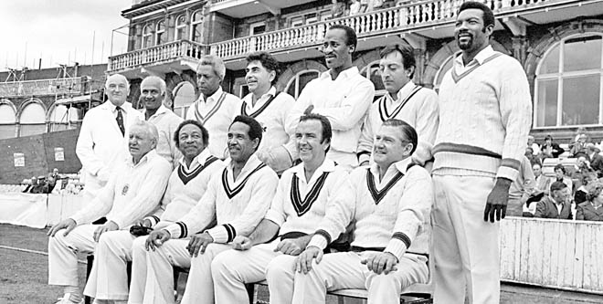 The Old World XI of 1983 at The Oval. Standing (left to right): unknown umpire, Rohan Kanhai, Lance Gibbs, Farokh Engineer, Vanburn Holder, Pataudi, and Charlie Griffith. Sitting: Ray Lindwall, Bertie Clarke, Garry Sobers, Bob Simpson and Neil Harvey.