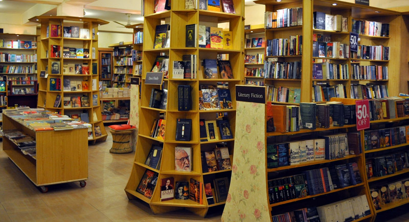Towering book shelves line the walls on both sides of the staircase that leads to the heart of the store. -- Photos by the author