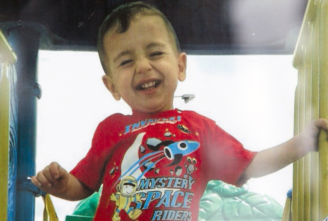 Innocent lost Alan Kurdi is all smiles in this endearing file photo.