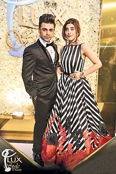 Farhan and real-life partner, Urwa Hocane, strike a pose at the Lux Style Awards, circa 2015. 