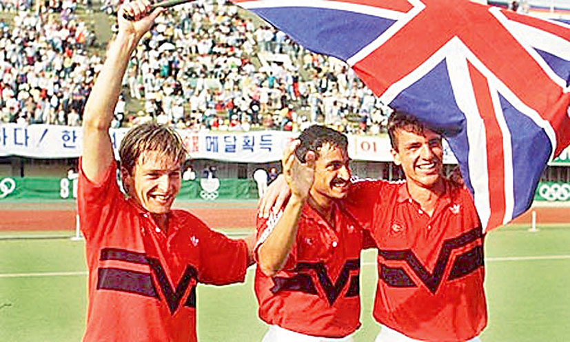 Imran Sherwani (C) celebrates with team mates after GB won  88 Olympic final