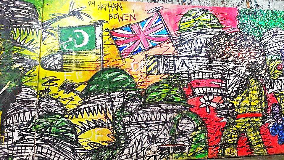 Graffiti by artist Nathan Bowen depicting the Pakistani flag and the Union Jack.