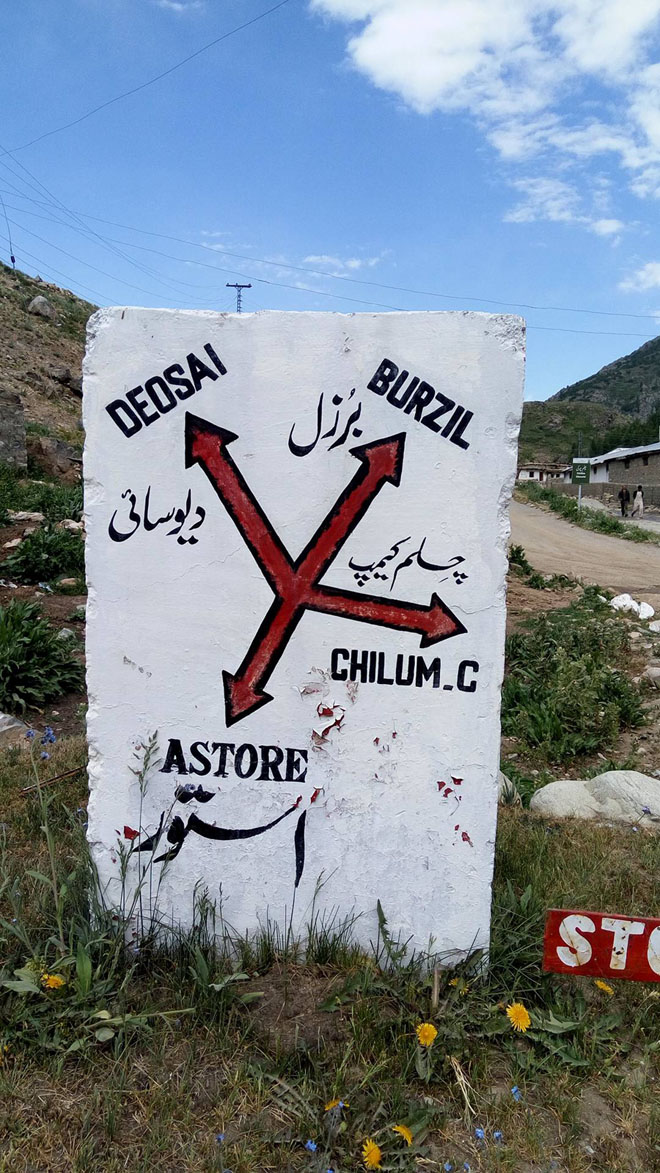 The milestone at a crossroads between Astore and Deosai. 