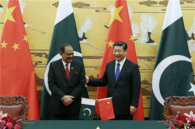 Mamoon Hussain with Xi Jinping.