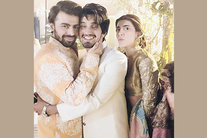 Uzair Jaswal with newly weds Farhan Saeed and Urwa Hocane.