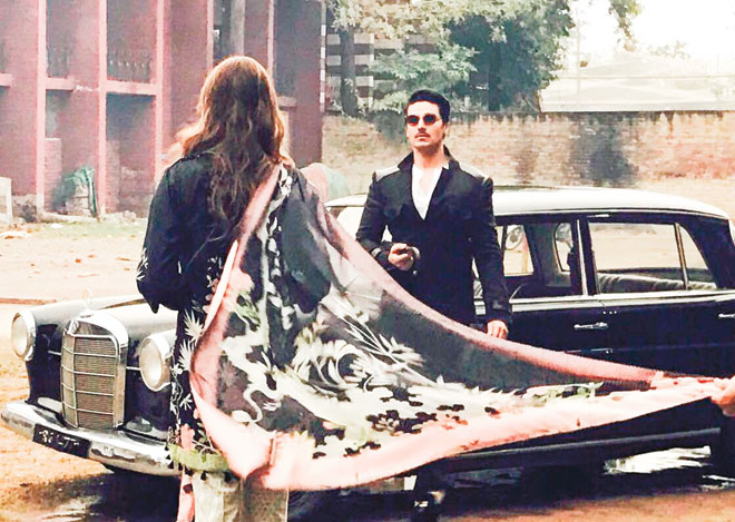 (Above) Ahsan Khan is featured in a shoot by Rungrez Lawn. 