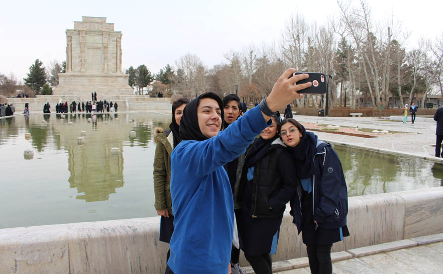 Students visiting the tomb of Ferdowsi in Tus.