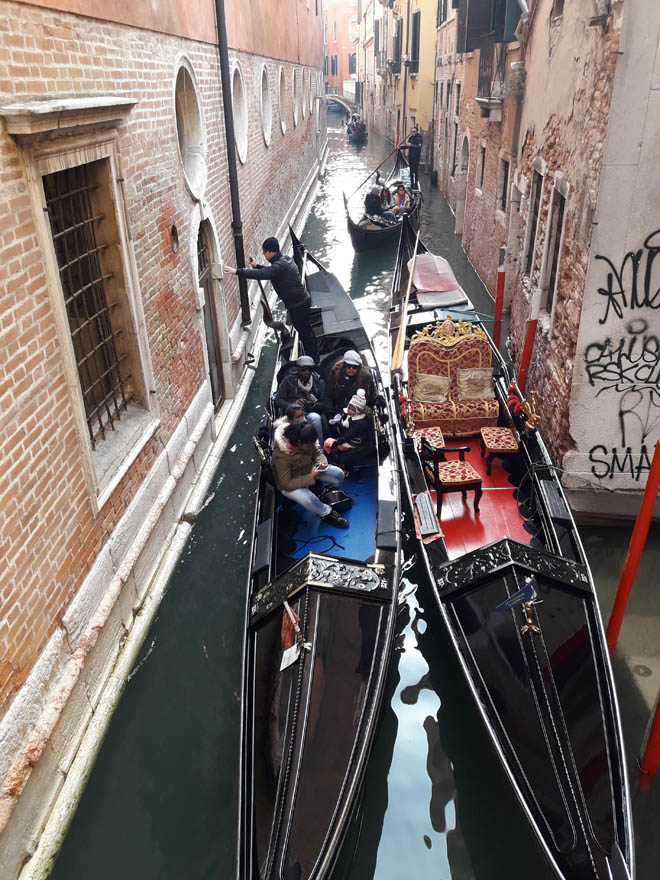 The tight gondola navigation in inner canals.