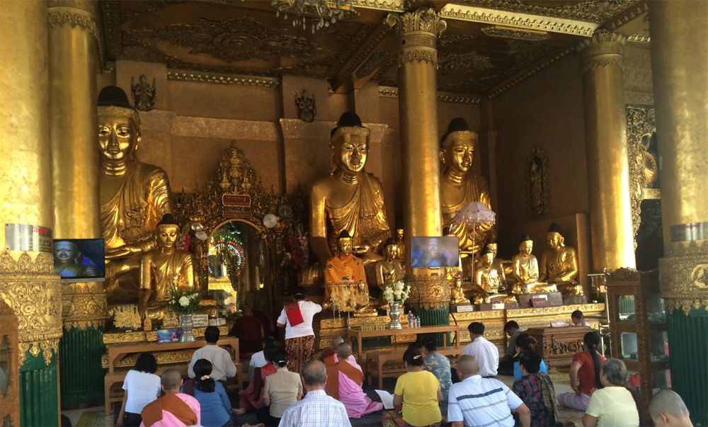 Prayers at one of the temples inside the Shwedagon Pagoda.