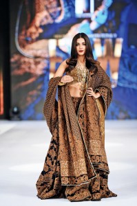 Adnan Pardesy took tradition out of the box with this black and copper bridal, modeled by actress Sonya Hussain.