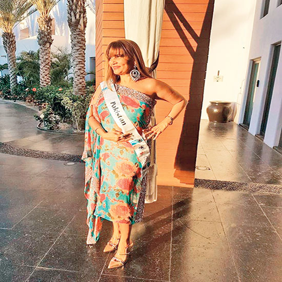 The first night in Mexico, where they were supposed to dress colourful, Frieha chose a turquoise and red floral Sadaf Malaterre off-shoulder chiffon dress with sequins. 