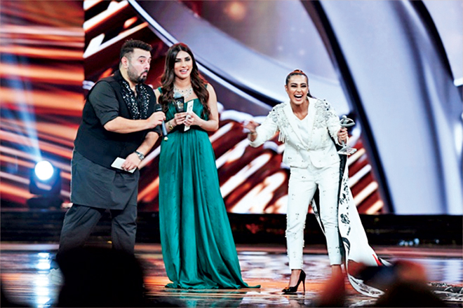 Iqra Aziz and beau attended the night dressed by Ali Xeeshan, who made the couple a set of similar jacket and pants. Iqra&rsquo;s outfit had a massive hand painted trail with what the designer called &lsquo;symbols of love&rsquo;. It was a great day for the actress who won two awards and also got engaged at the event but we do think the trail was too much to carry for someone with a frame as petite as hers.