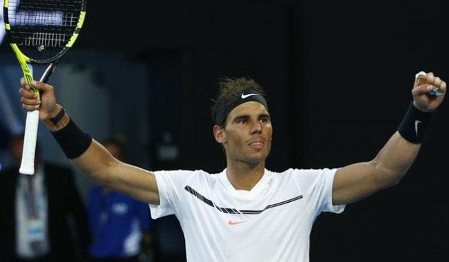 Nadal holds off rising talent Zverev to reach last 16