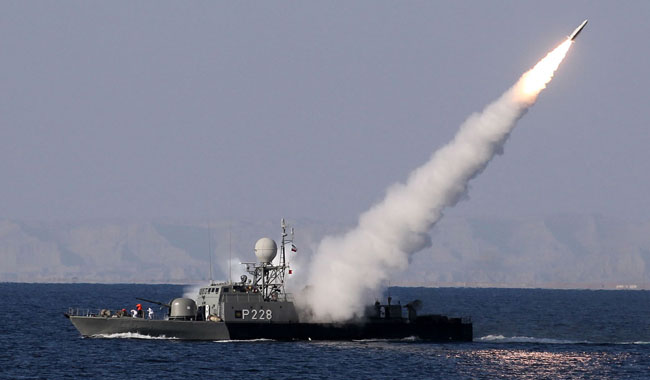 Iran tests missiles in naval exercises