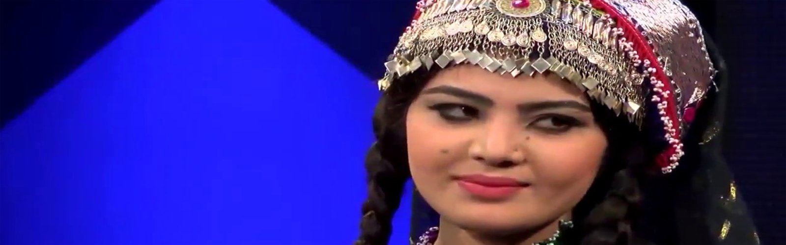 Afghan music contest pits first female finalist against rapper