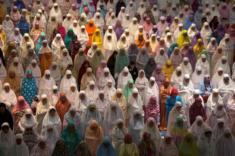 Muslim women attend prayers at the first day of the holy fasting month of Ramadan at Al-Akbar Mosque, Surabaya, East Java, Indonesia. REUTERS