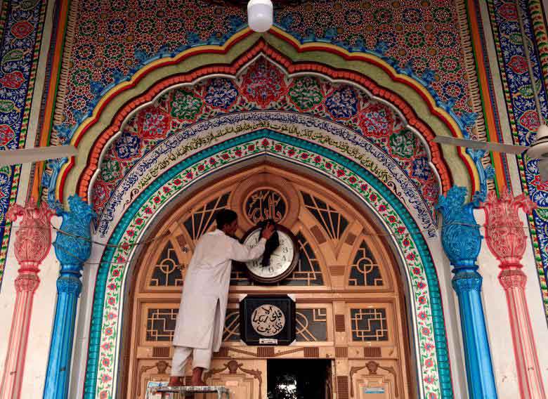 A man carries out cleaning work at Jamia Masjid (Grand Mosque) ahead of Muslim holy month of Ramadan in Rawalpindi, Pakistan. REUTERS