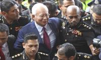 Former Malaysian PM Najib charged with criminal breach of trust