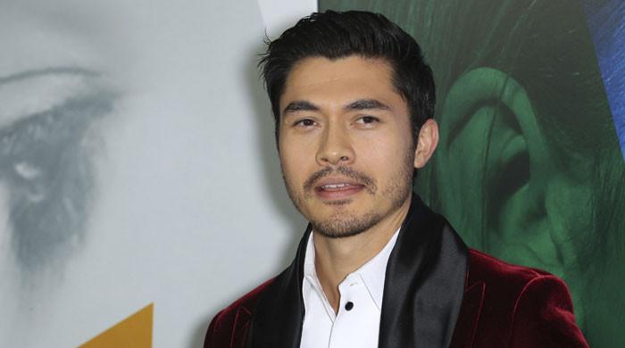 Henry Golding reminisces over shift in perspective after welcoming Fatherhood