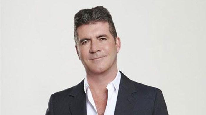 Alarm bells ring for Simon Cowell after 'suspicious man loiters' outside his home