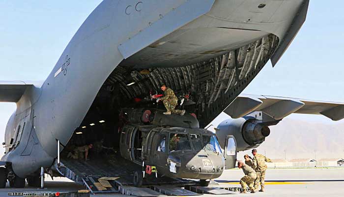US forces transporting military hardware from Bagram Air Base. -AFP