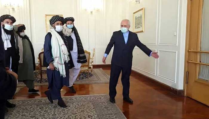 Irans Javad Zarif welcomes Talibans political leader in Tehran. File