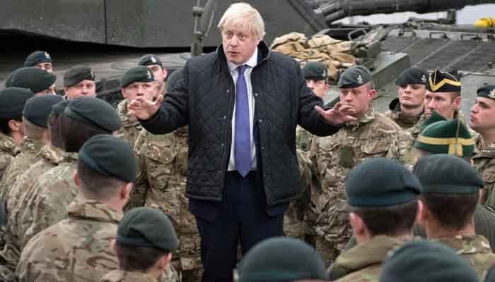 Britains Prime Minister Boris Johnson speaks with troops. Photo: AFP