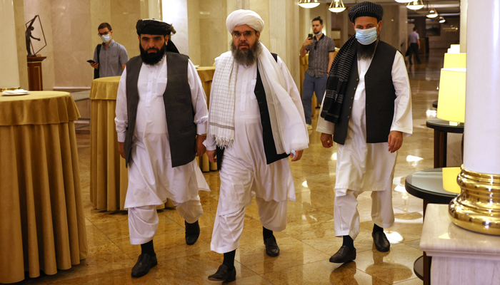 Leaders of the Taliban movement and negotiators Abdul Latif Mansoor (R), Shahabuddin Delawar (C) and Suhail Shaheen (L) walk to attend a press conference in Moscow on July 9, 2021. Phoio: AFP