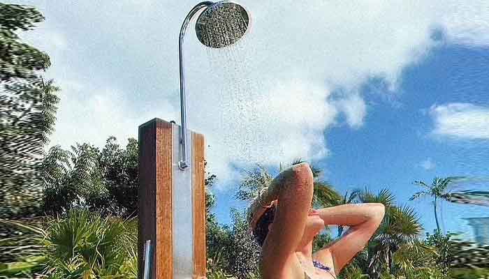 Khloe Kardashian takes steamy outdoor shower to tease Tristan Thompson