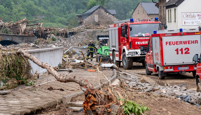 Members of the fire brigade help during clearing work in Altenahr, western Germany, after heavy rain hit parts of the country, causing widespread flooding and major damage. Rescue workers scrambled on July 17 to find survivors and victims of the devastation wreaked by the worst floods to hit western Europe in living memory, which have already left more than 150 people dead and dozens more missing. — AFP