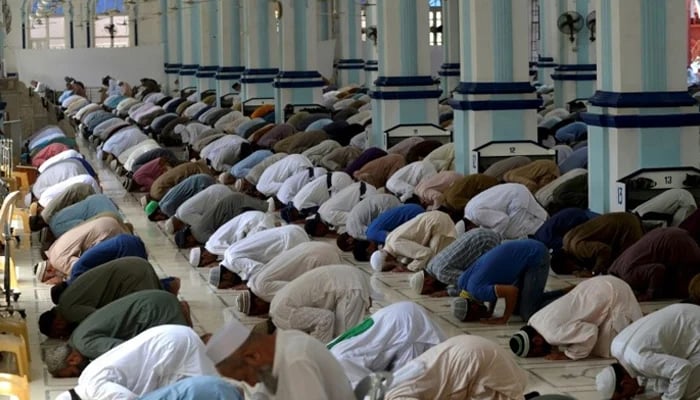 Muslims seen offering prayers in a mosque — AFP/File