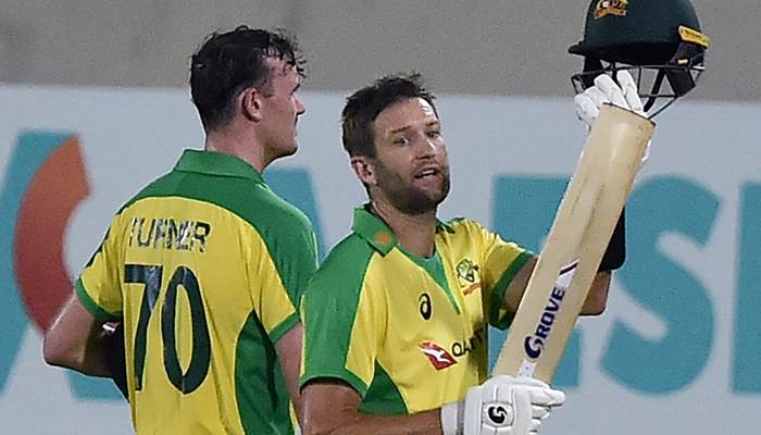 Australia´s cricketers leave the field after winning the fourth Twenty20 international cricket match between Bangladesh and Australia at the Sher-e-Bangla National Cricket Stadium in Dhaka on August 7, 2021. — AFP