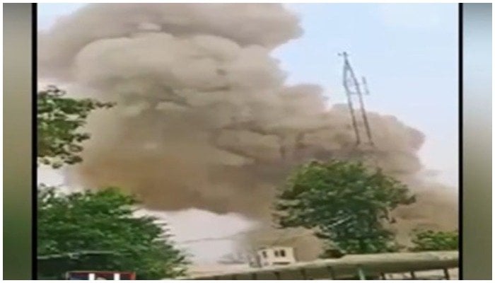 Clouds of smoke seen emerging from the building of POF. Photo: Screengrab via Geo News.
