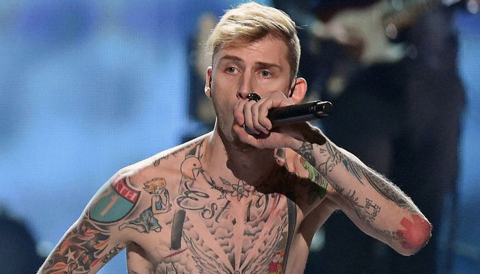 Machine Gun Kelly is not bald, sported bald cap for new song