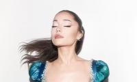 Ariana Grande looks drop dead gorgeous in blue crop top and skirt