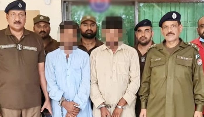 Arrested Suspects Stand Handcuffed. Photo Geo News