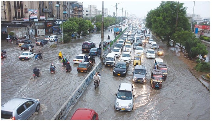Traffic moves slowly on the arterial University Road in Karachi in this Online file photo.