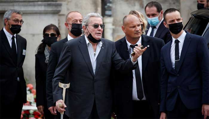 Alain Delon makes rare public appearance at funeral of Belmondo