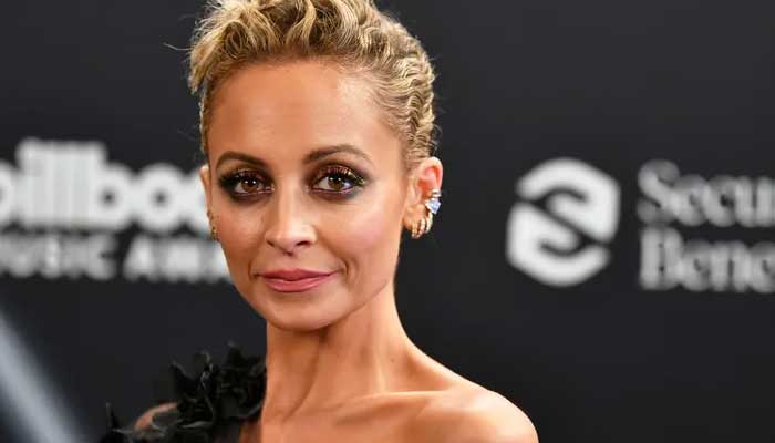 Nicole Richie’s hair catches fire as she blows on Birthday candles
