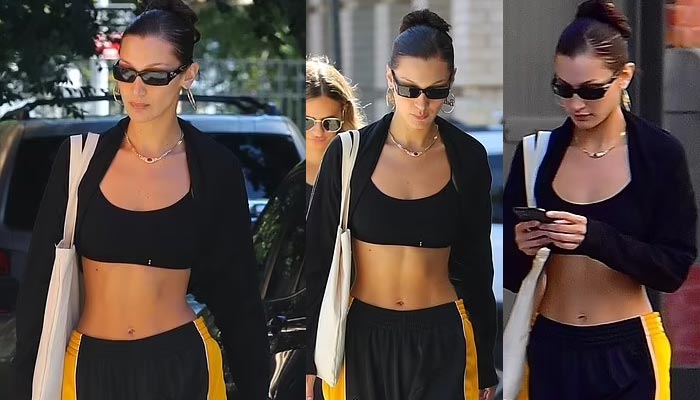 Bella Hadid puts her toned tummy on display during her outing in NYC