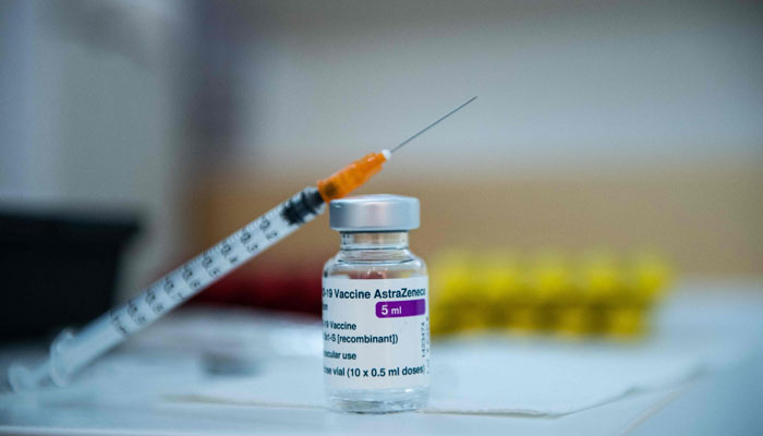 This photograph shows a syringe poses on a vial of AstraZeneca anti-COVID-19 vaccine in a pharmacy in Paris on March 12, 2021. — AFP/File