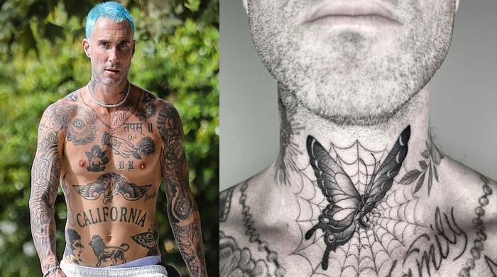 Adam Levine says he 'had to' get a tattoo. 