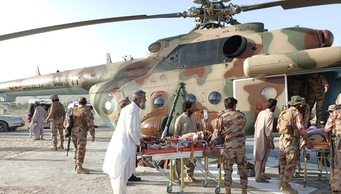 People injured in the Balochistan earthquake are being shifted to the hospital via a Pakistan Army helicopter.