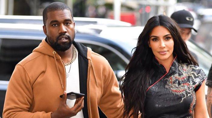 Kim Kardashian keeps Kanye West's last name during SNL promo