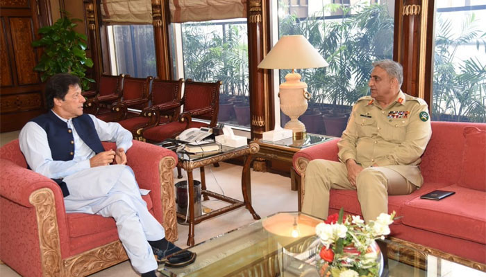 Prime Minister Imran Khan (L) and Chief of Army Staff General Qamar Javed (R) are discussing important matters during a meeting. Photo: file