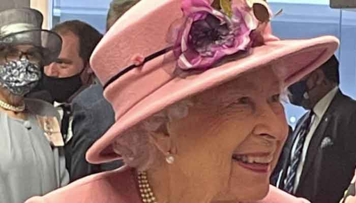 Queen Elizabeth looks really well as she uses walking stick